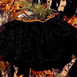 Black with gold skirt